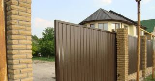 Купить откатные ворота из профнастила Аксай, цена от 1770 руб.